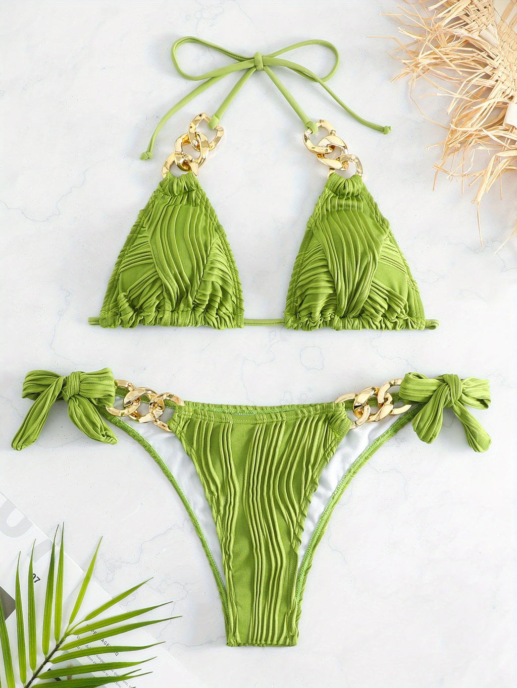 Green striped halter bikini set with bow ties and gold ring-link details