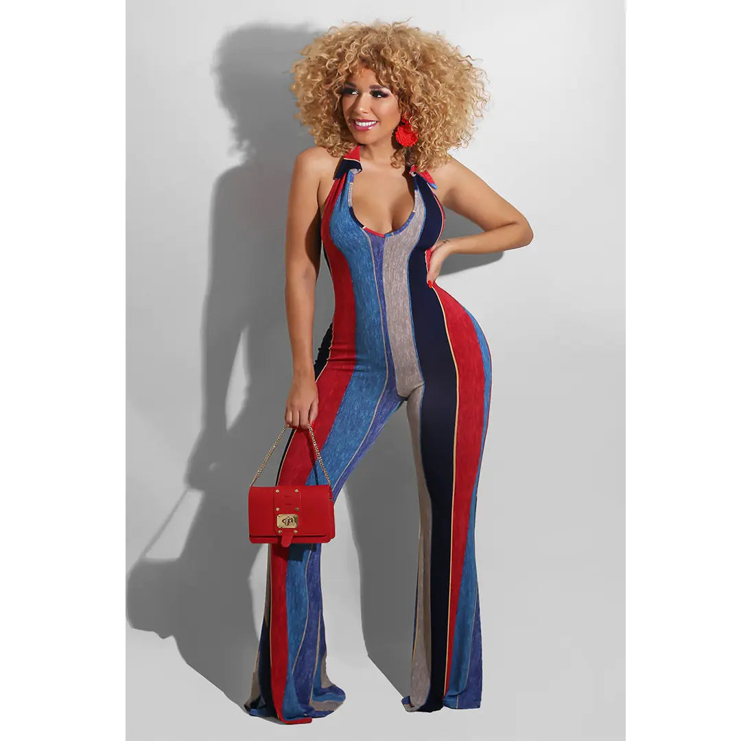 Sleeveless patchwork one-piece with blue vertical panels, red accents, and black trim
