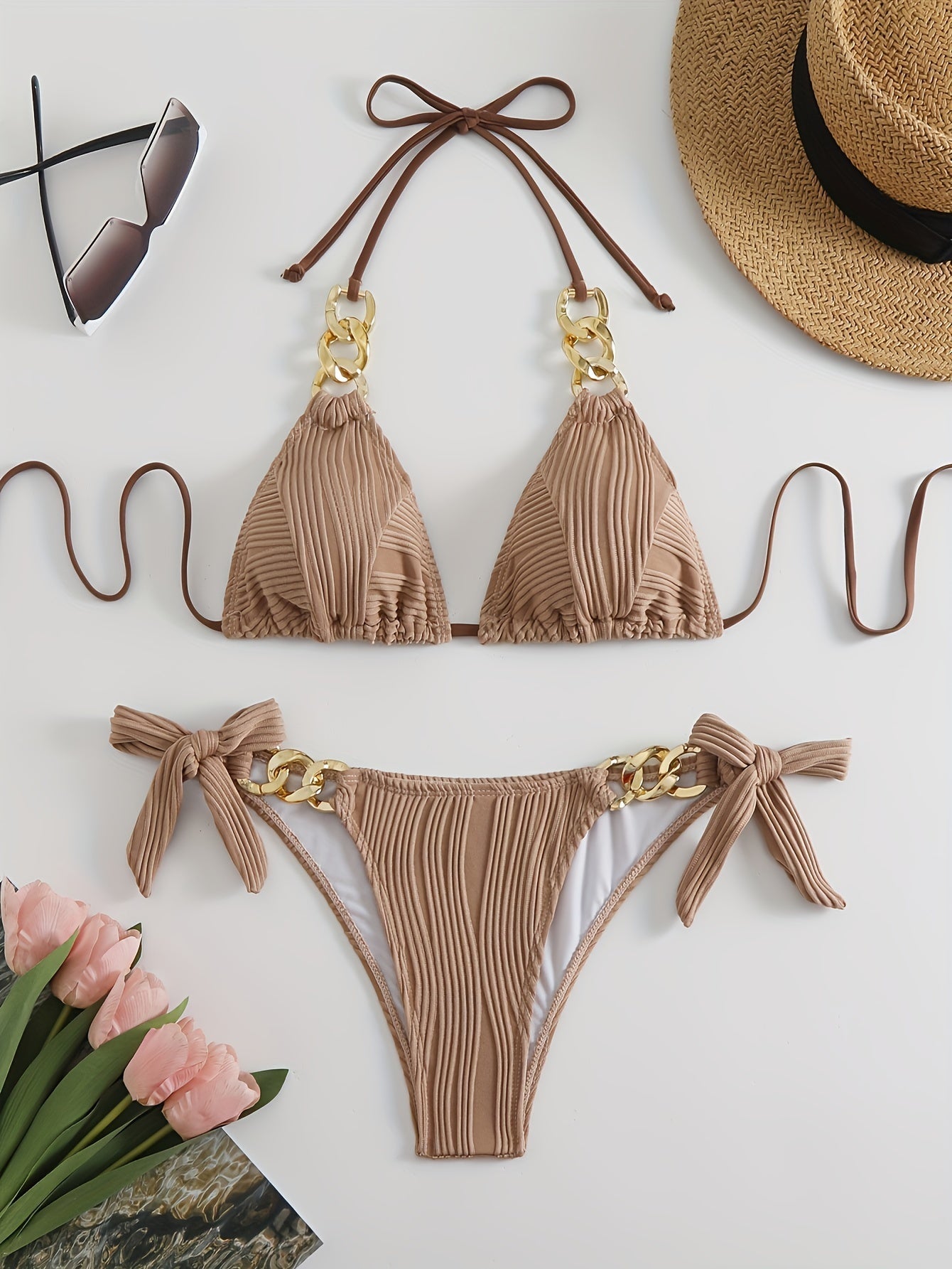 Beige striped halter bikini set with gold ring-link detail and bow tie side ties