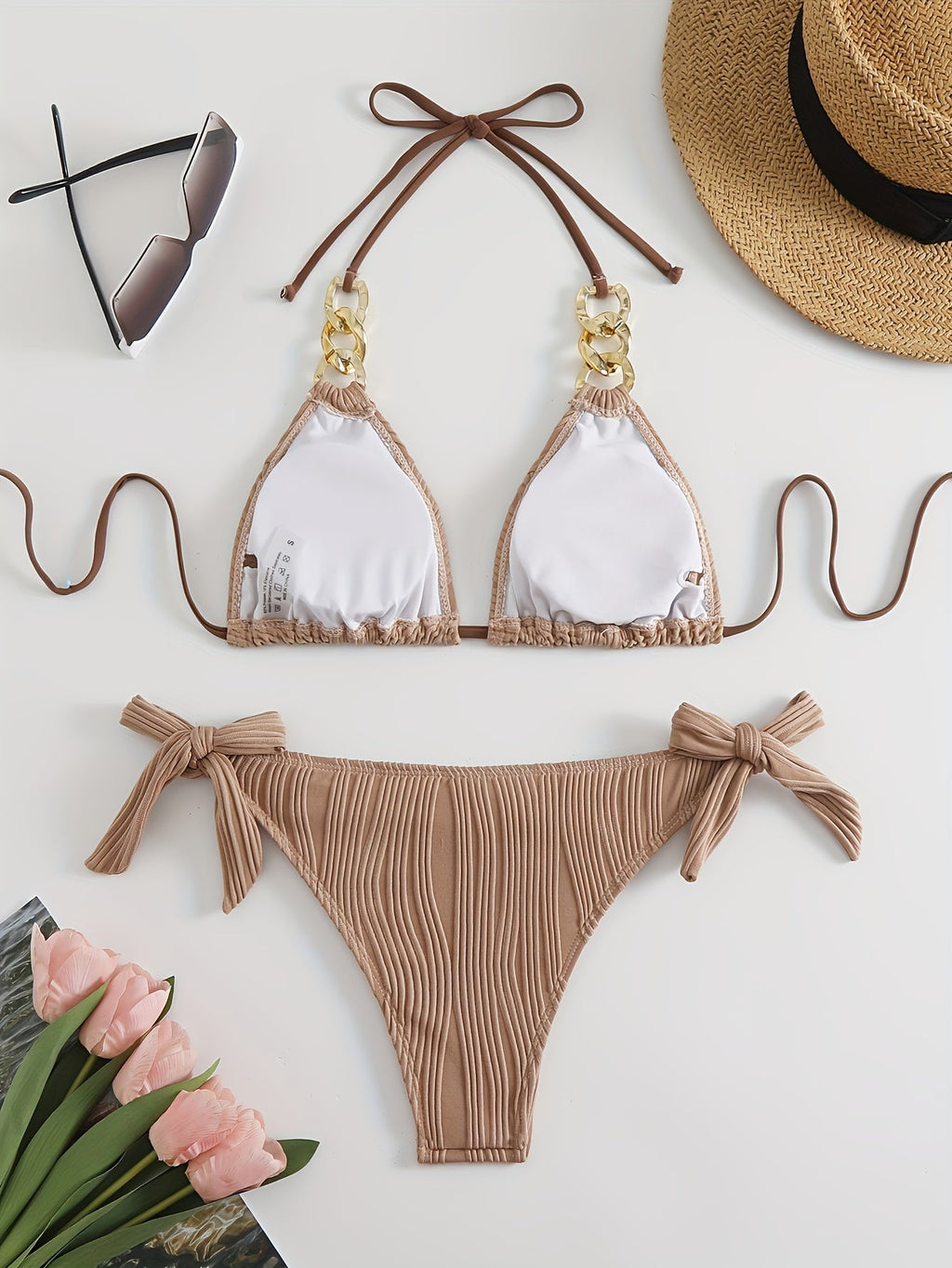 Brown striped halter bikini set with gold ring-link detail and bow tie side ties