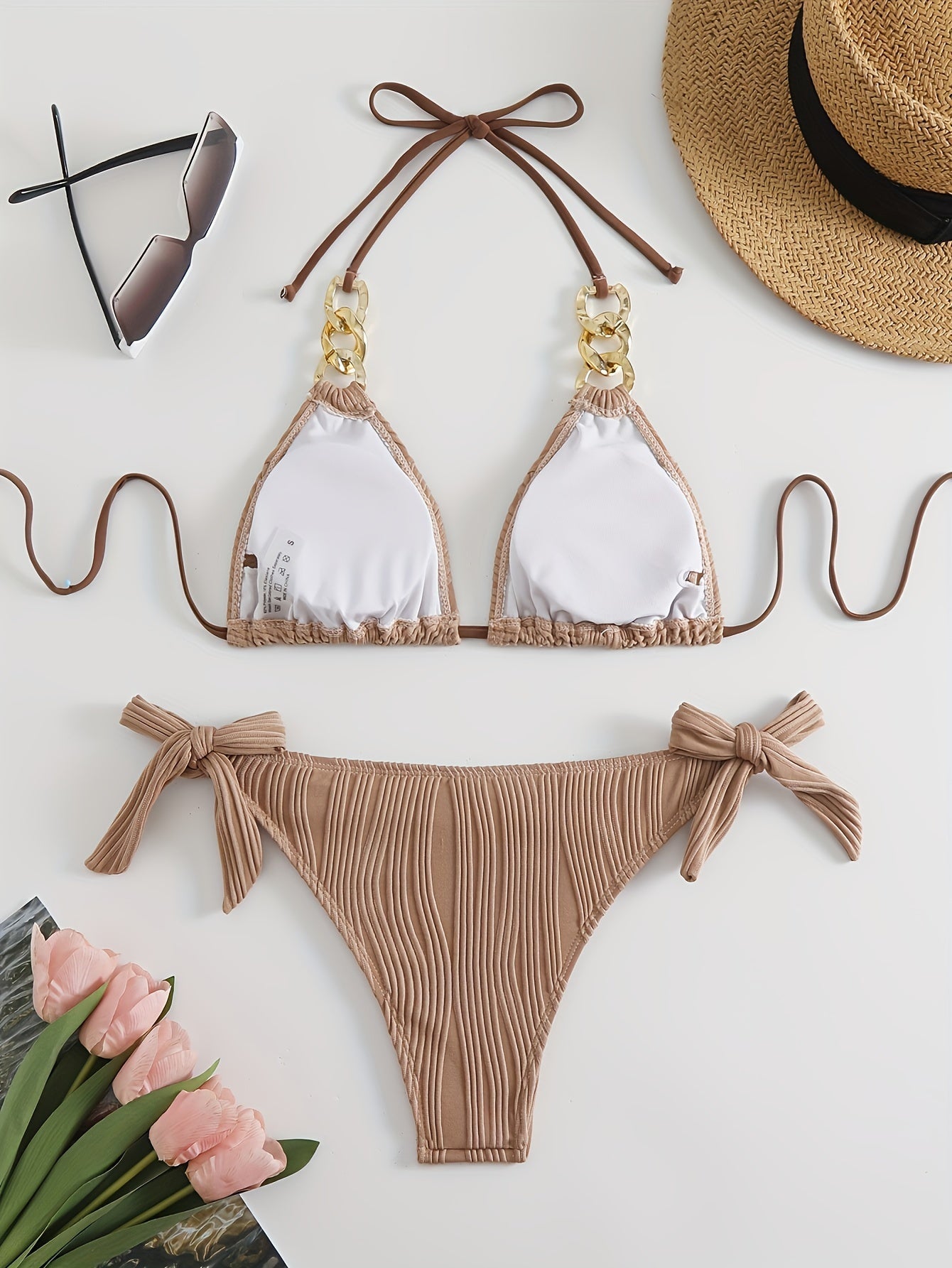 Brown striped halter bikini set with gold ring-link detail and bow tie side ties