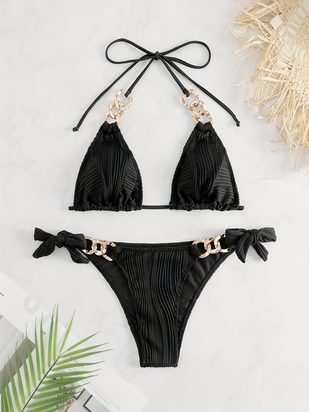 Black striped halter bikini set with gold ring-link detail and bow tie side ties