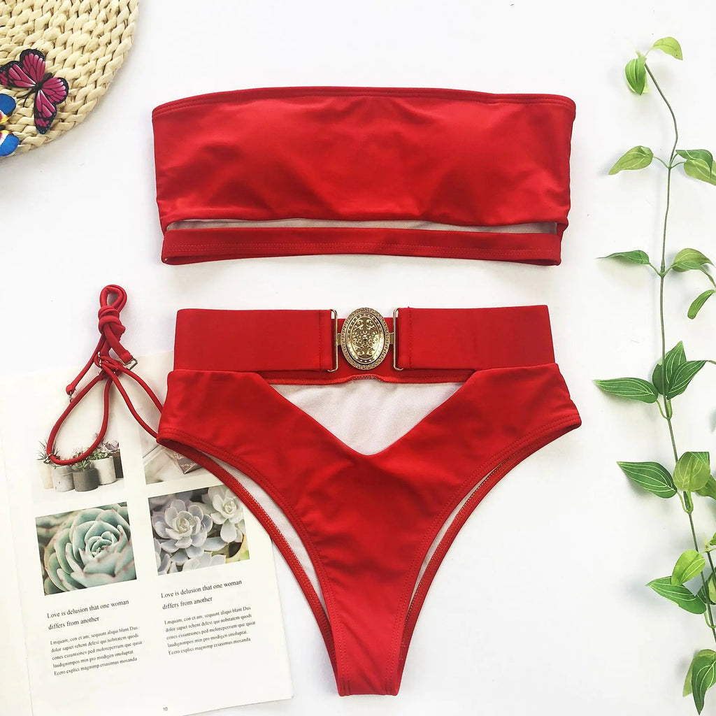 Red bandeau bikini top with matching high-waist bottoms and center belt buckle.