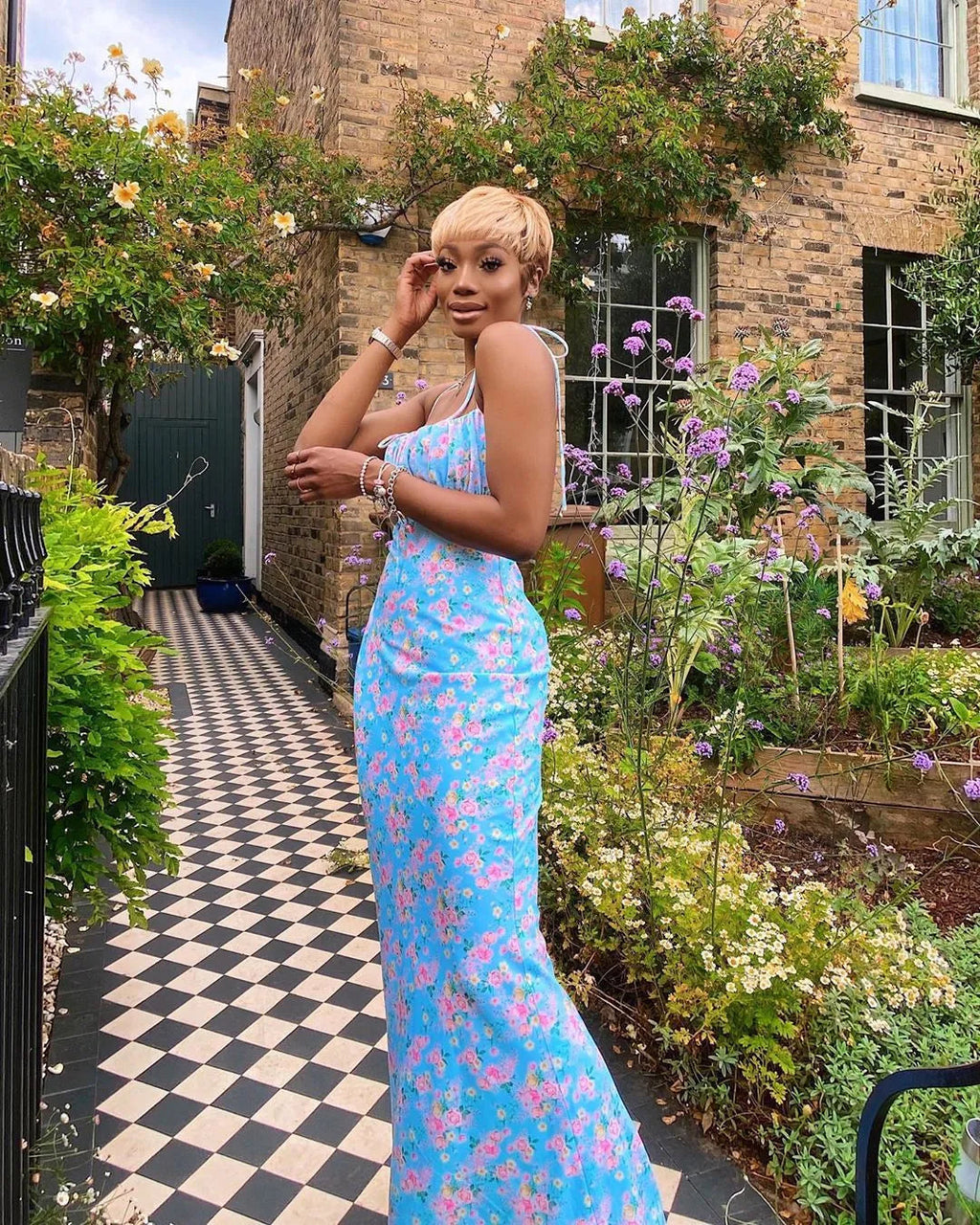 Blue floral maxi dress with spaghetti straps and ruched gathered bust