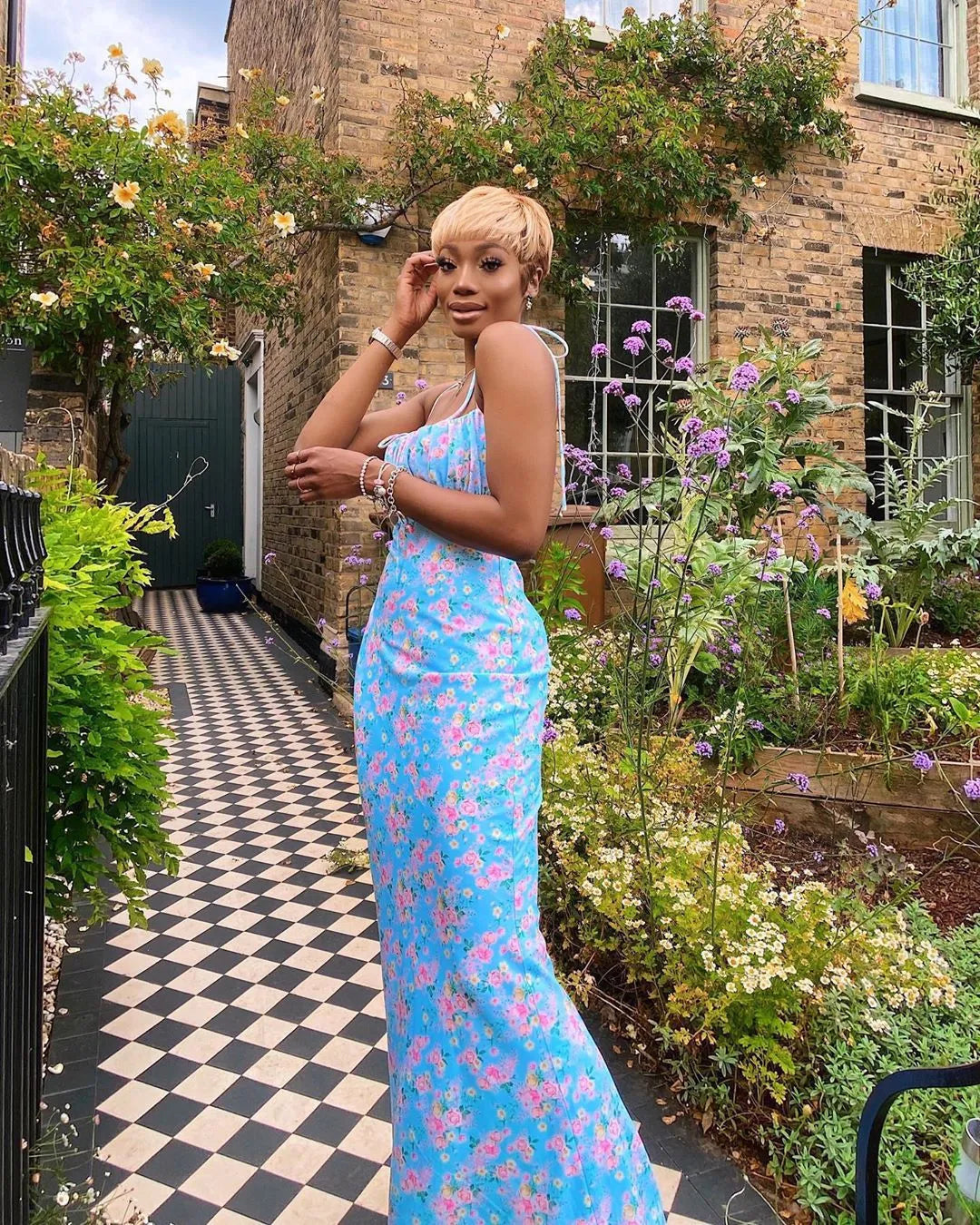 Blue floral maxi dress with spaghetti straps and ruched gathered bust