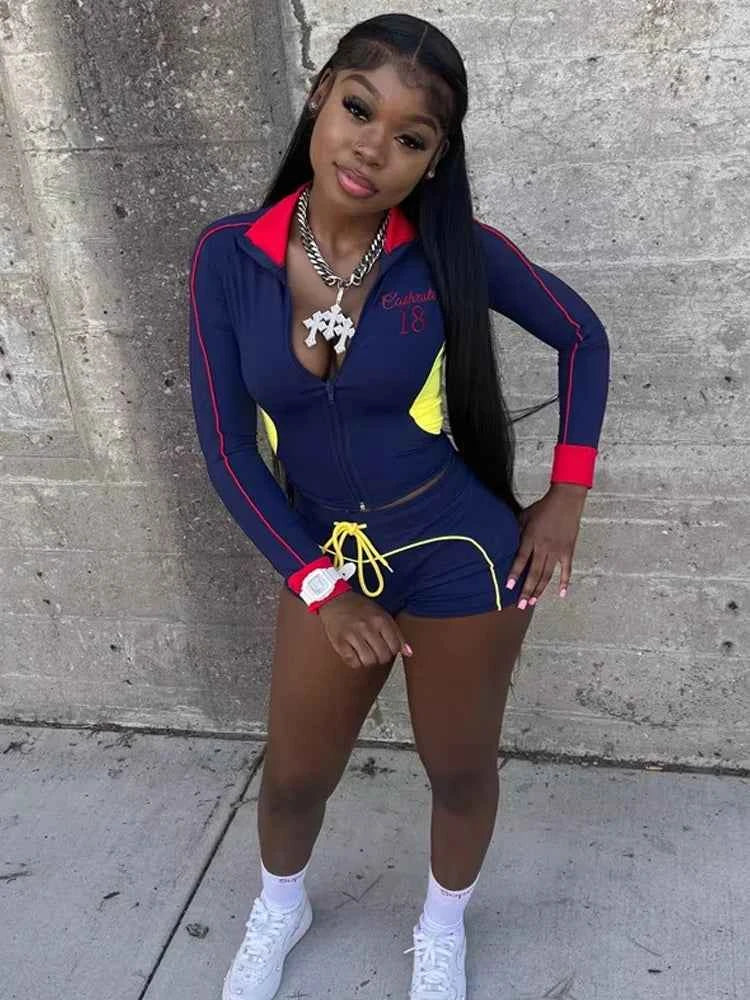 Color-block zip jacket and drawstring shorts set, navy with red and yellow accents