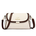 Cream textured crossbody bag with top flap and adjustable shoulder strap