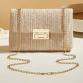 Beige woven straw crossbody bag with gold clasp and long chain strap