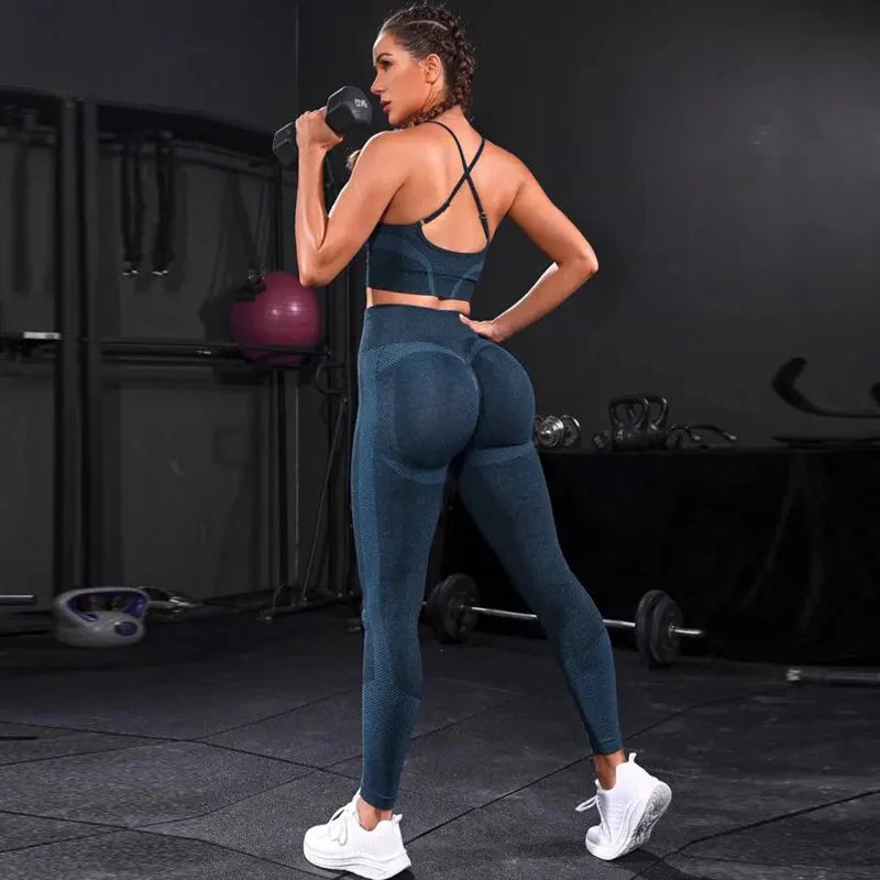 Blue strappy sports bra and high-rise leggings set, full-length front view