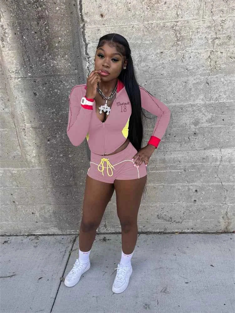 Color-block zip jacket and drawstring shorts set, light pink with red and yellow accents