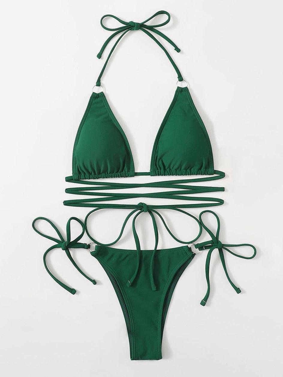 Dark green triangle bikini top and matching tie-side bottom, flat lay