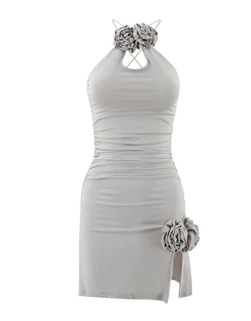 Light halter mini dress with bow neckline and rose applique at side slit