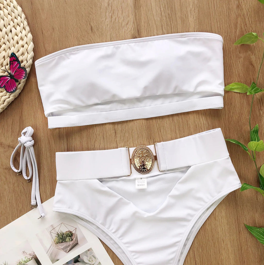 White bandeau bikini top and high-rise bottoms with gold center buckle
